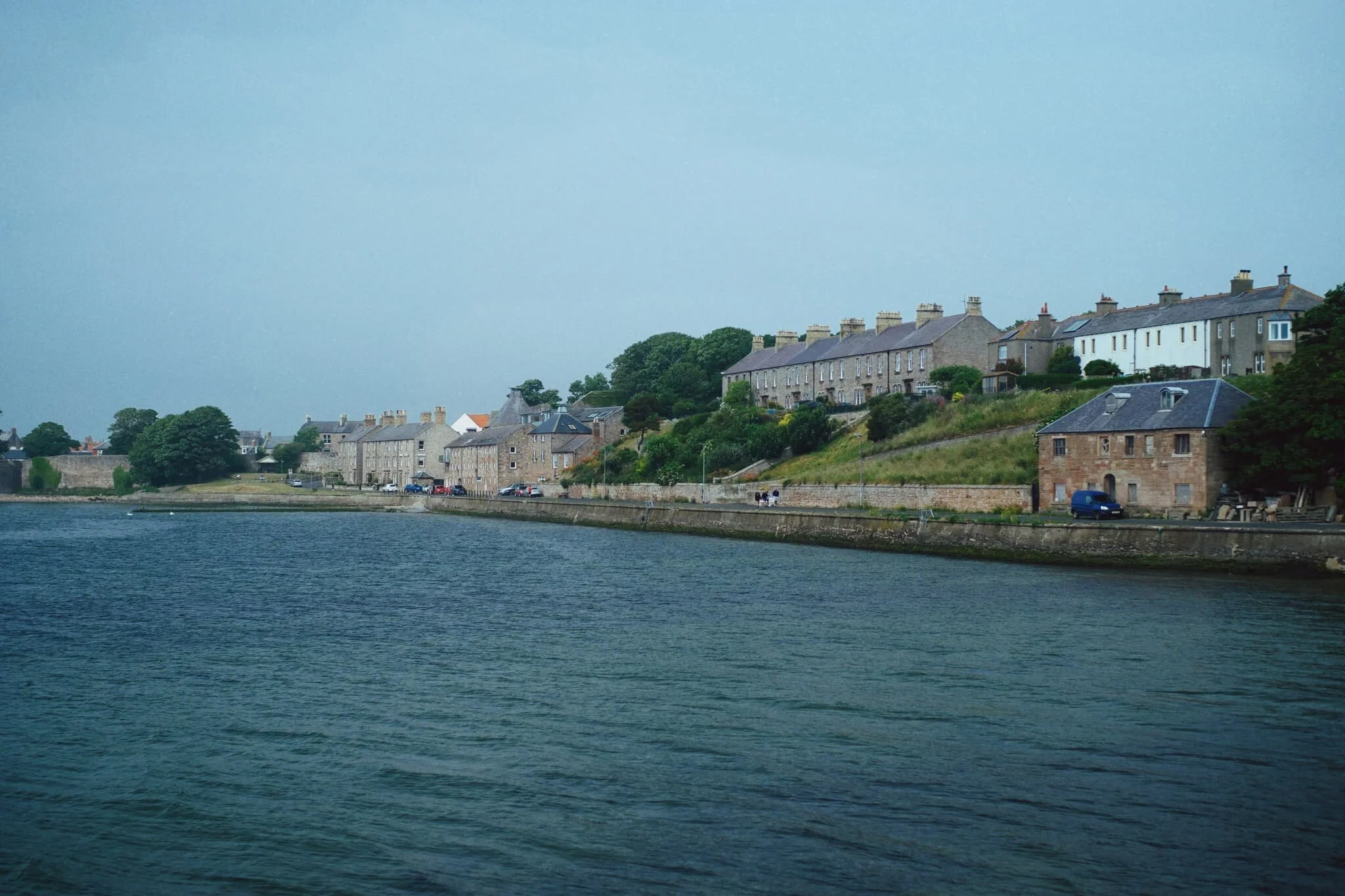 Old riverside properties as the Tweed pours out into the North Sea.