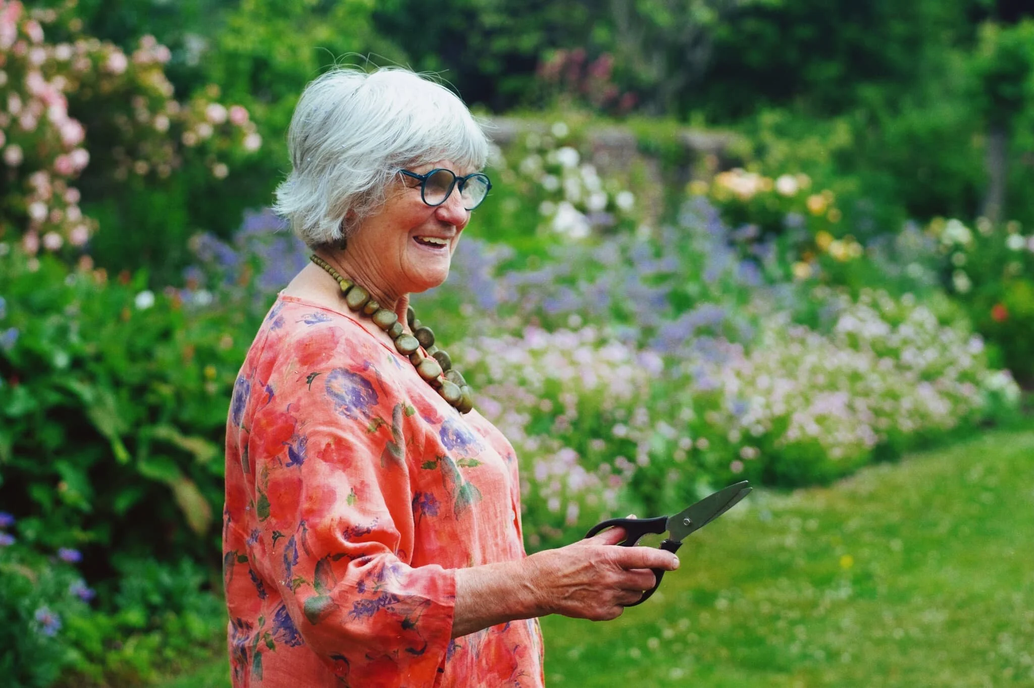 Story time! As we made our way back through Berwick town, we stopped outside someone’s house to admire their front garden filled with flowers. Lisabet took some photos. As she did, an old gentleman enquired approached us to ask about our activity. After learning we were just admiring his garden, he simply invited us through to their back garden, which was even more fecund and filled with all sorts of flowers and vegetables. The “lady of house” was very enthusiastic about her gardening, and was more than happy to meet us and run through the garden with her. I snapped this quick portrait of her. What a wonderfully welcoming and friendly pair they were!