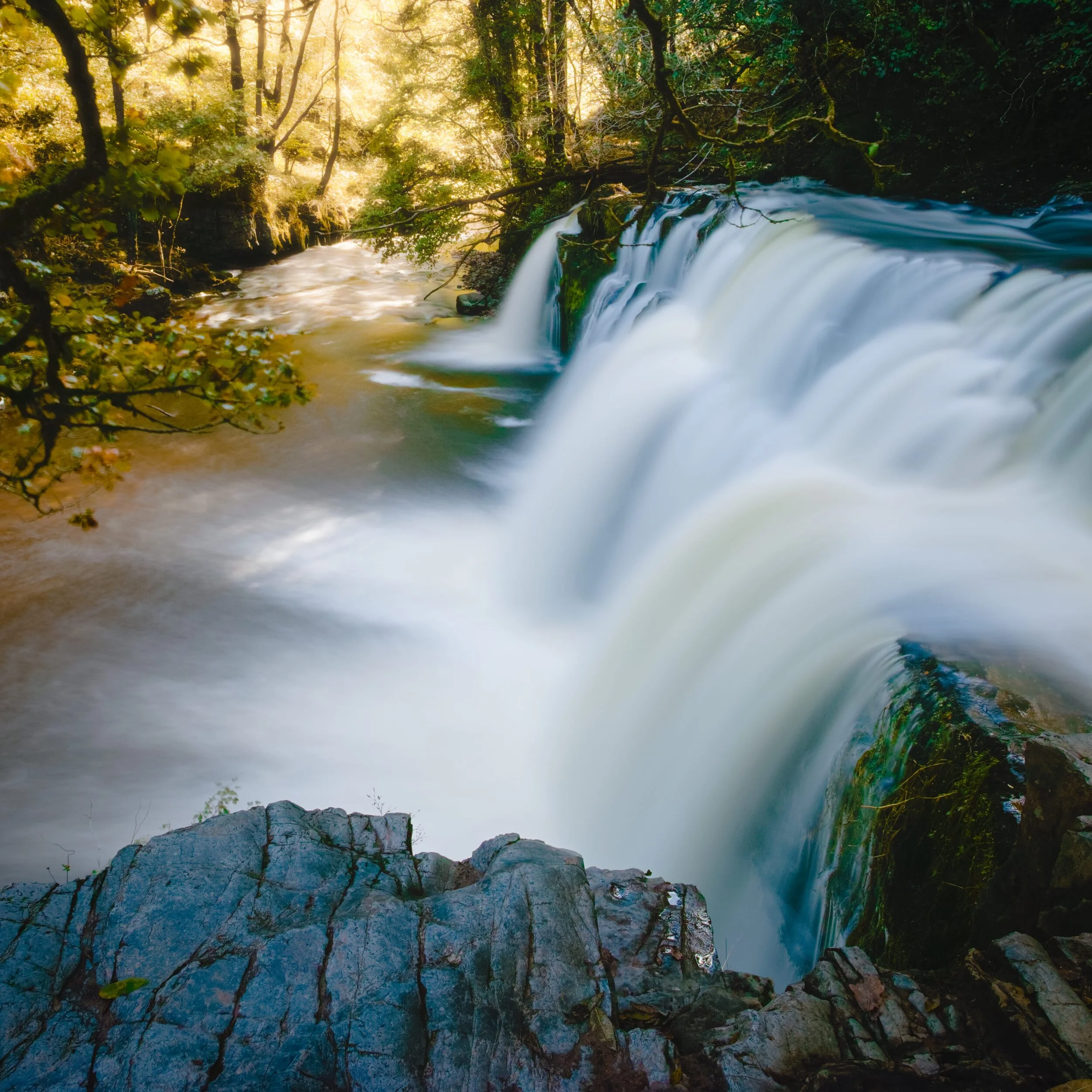 Sgwd y Pannwr (“SGOOD ee pann-ooer”, meaning “Falls of the Fuller”), which we were able to get right next to after a particularly gruelling hike down the ravine. The roar and sheer power of the water…