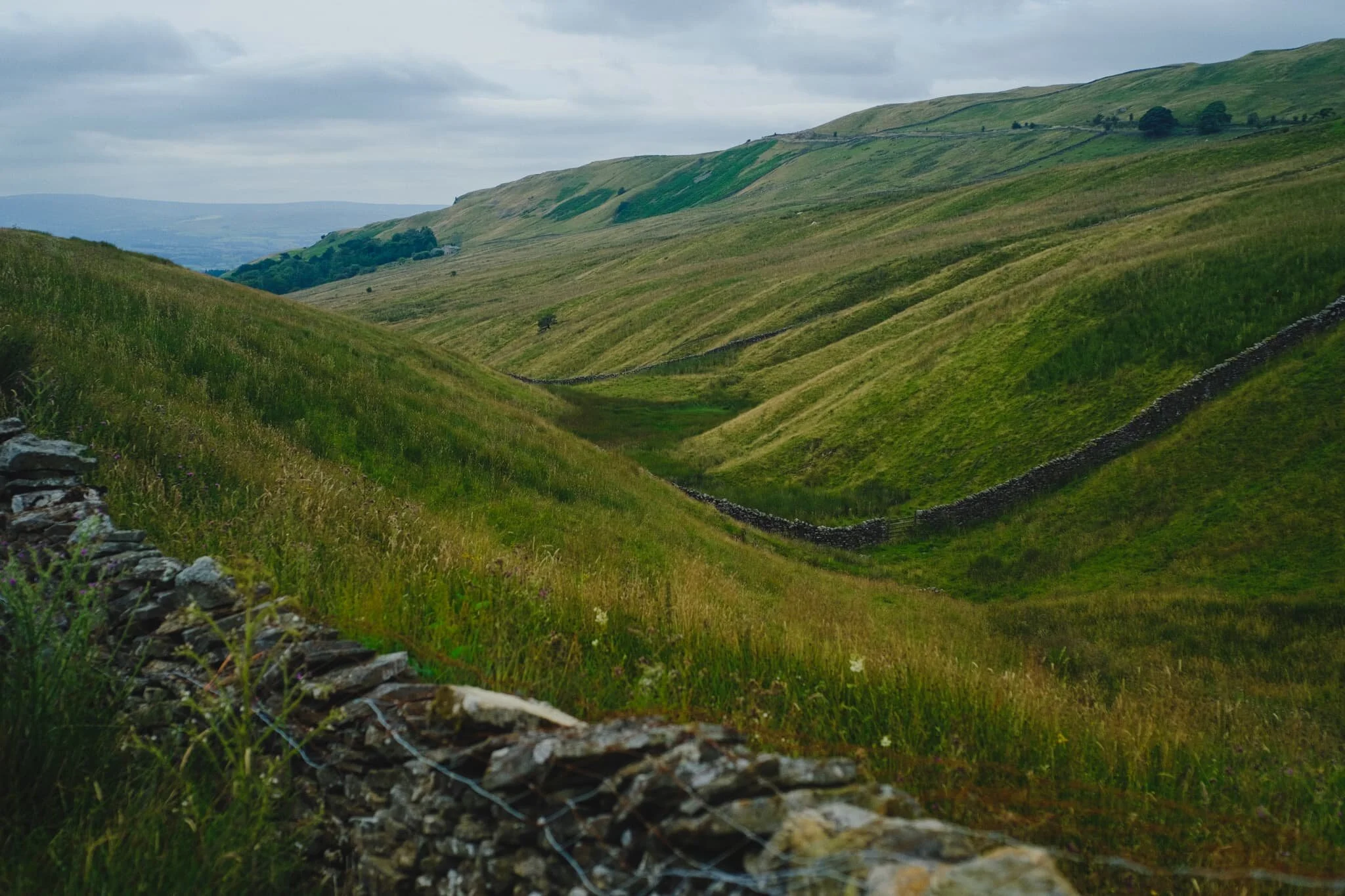 The Bullpot valley features lots of dry stone walls that expertly trace the steep curves of the dale.