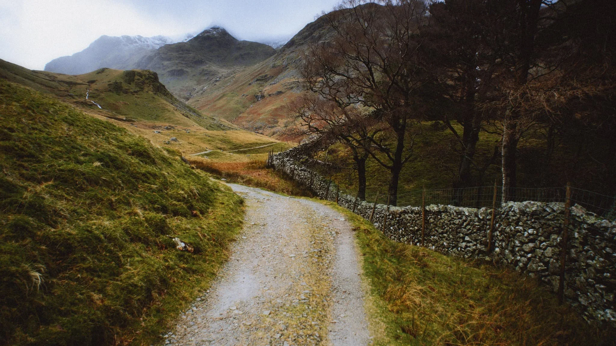 As the cloud cover finally starts to lift, Falcon Crag and Tarn Crag emerge from behind Dollywaggon Pike.