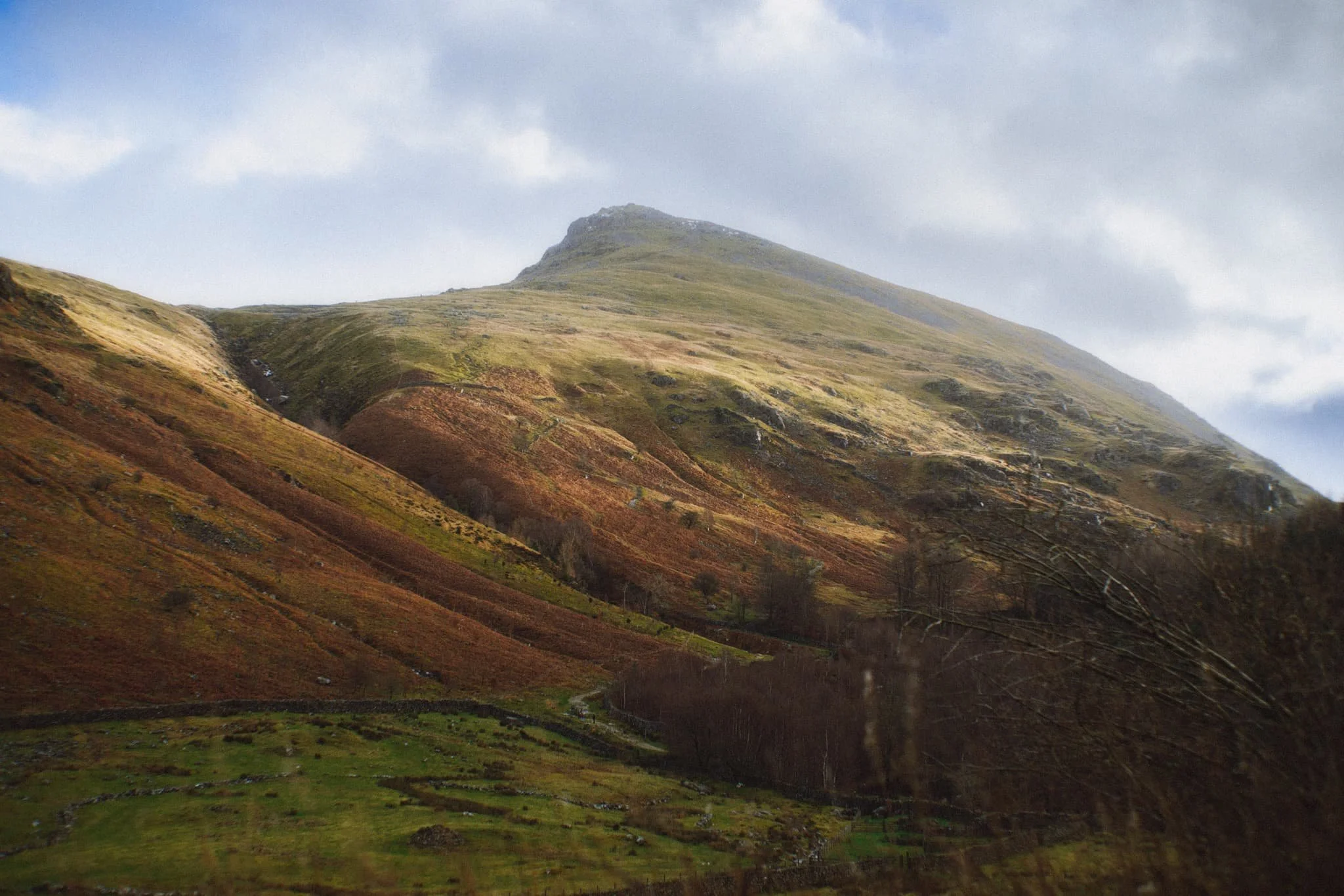 The distinctive shape of Browncove Crags, a subsidiary top of Helvellyn, with another deep gill caused by Helvellyn Gill.