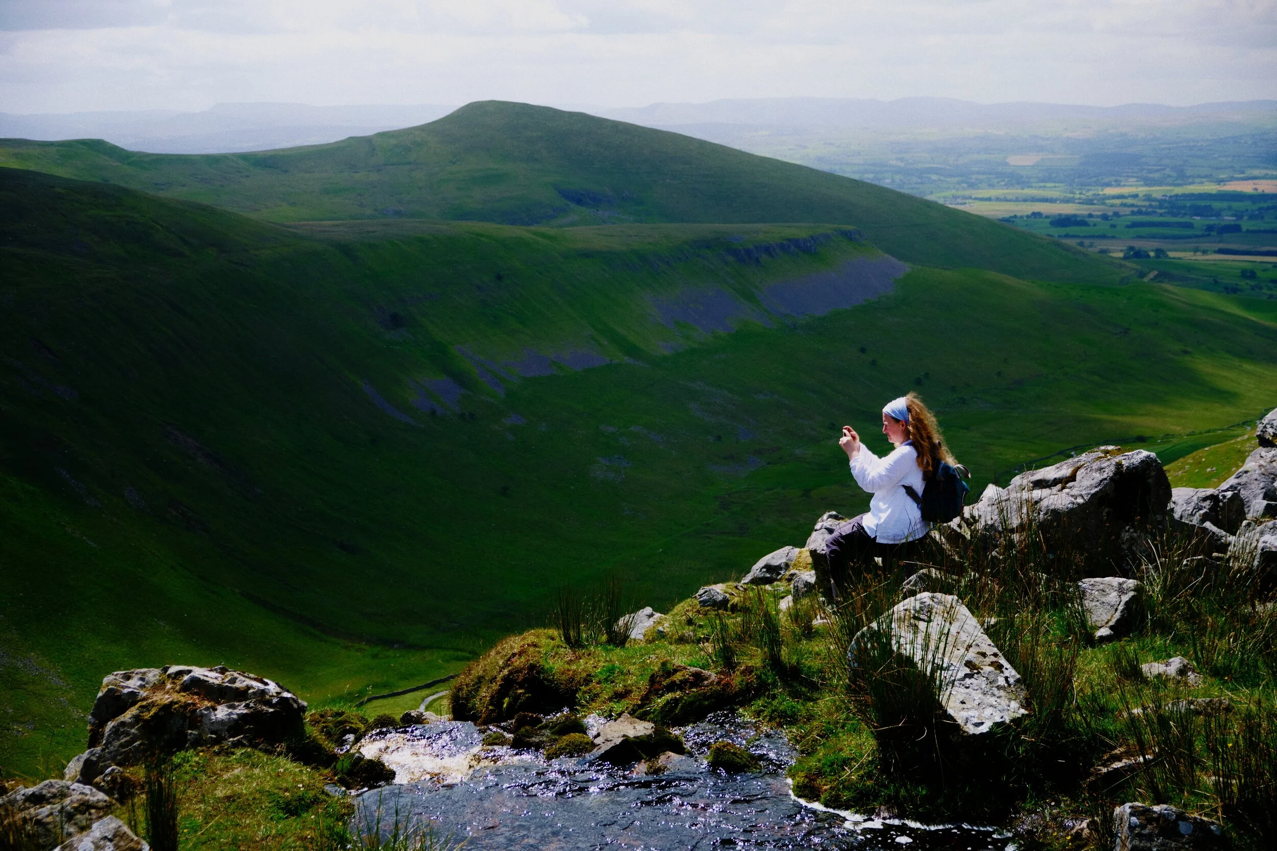 My lovely Lisabet enjoys the view back towards the head of High Cup Nick.