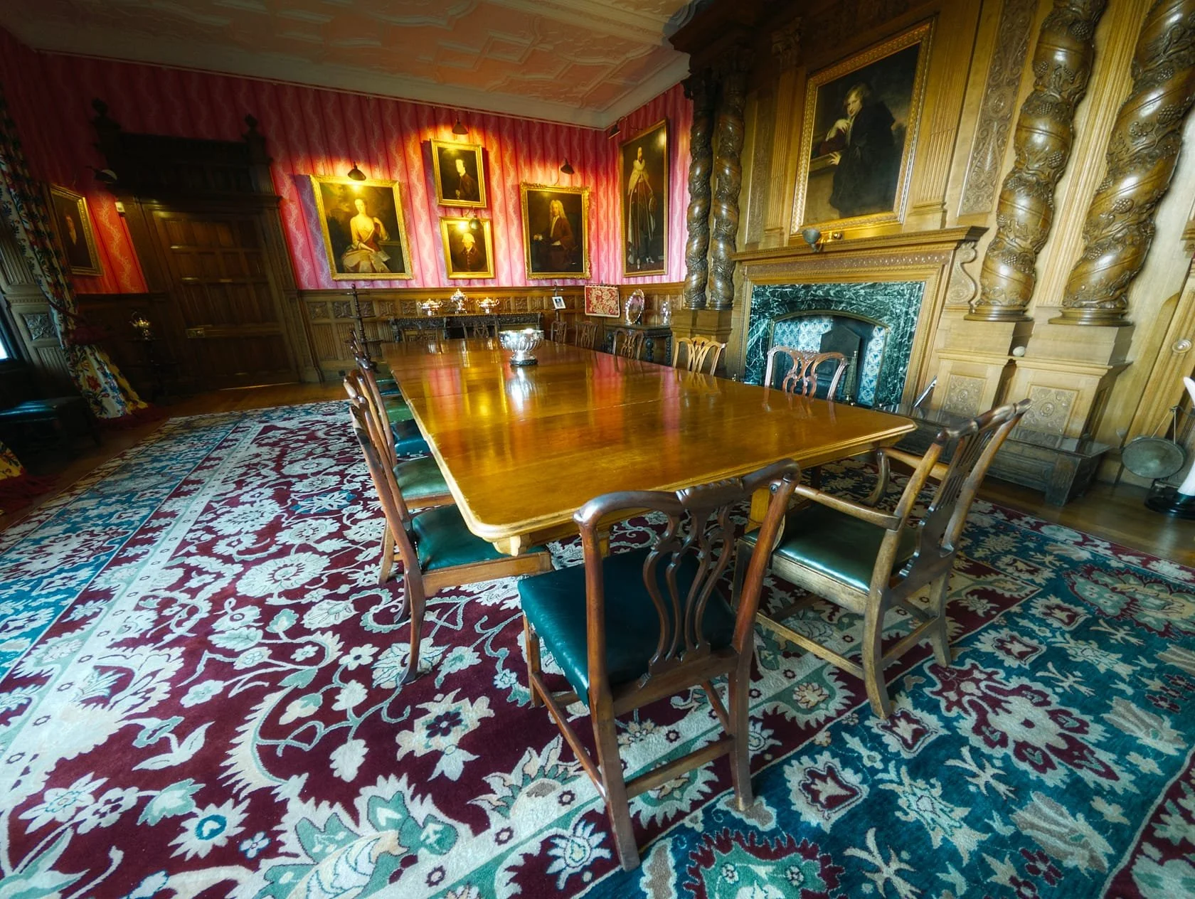 The Dining Room, with an extremely impressive fireplace mantel and decorative jambs.