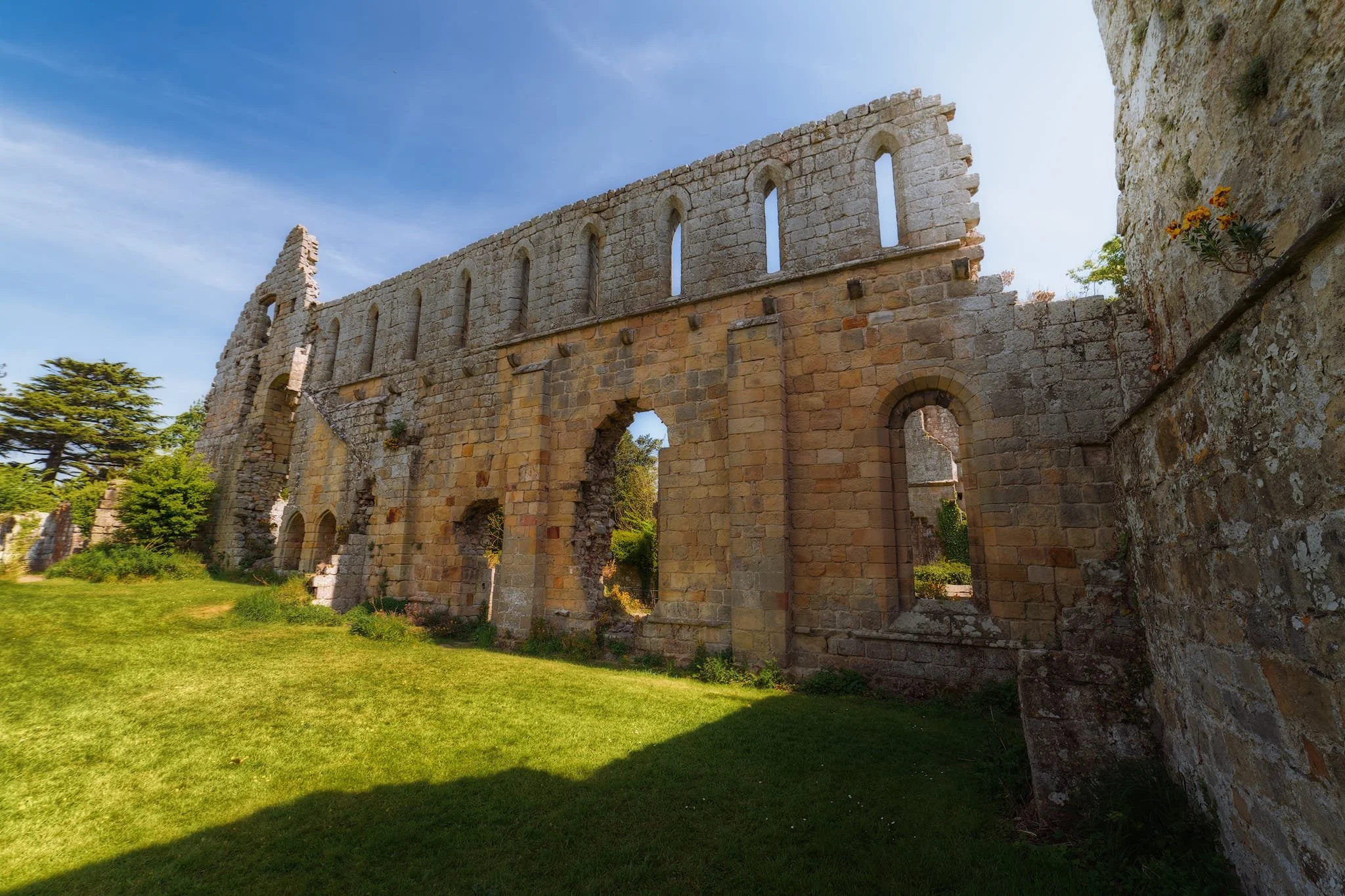 It was such a glorious day, with nary a cloud in the sky, that the challenge for me in photographing this place was finding compositions that were not just interesting but also provided a good balance between shadow and light. This meant hiding under arches and walls so I could be in shadow whilst the light illuminated the subject, such as this alternative view of the Cloister wall.