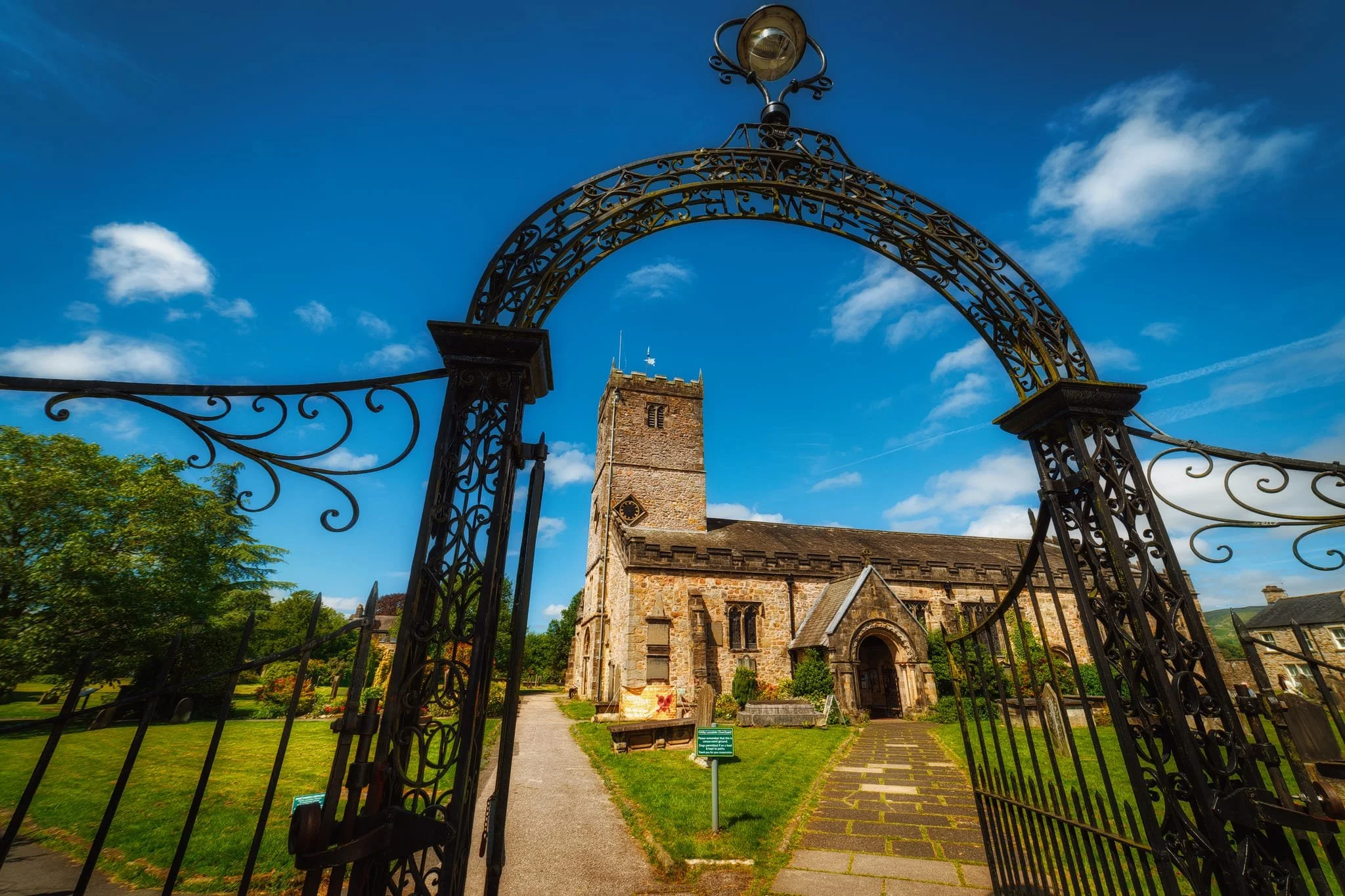 Up and beyond the Radical Steps, I equip my 14mm ultra-wide lens and frame this composition of St. Mary’s Church using the old gateway. Parts of the church date from Norman times.
