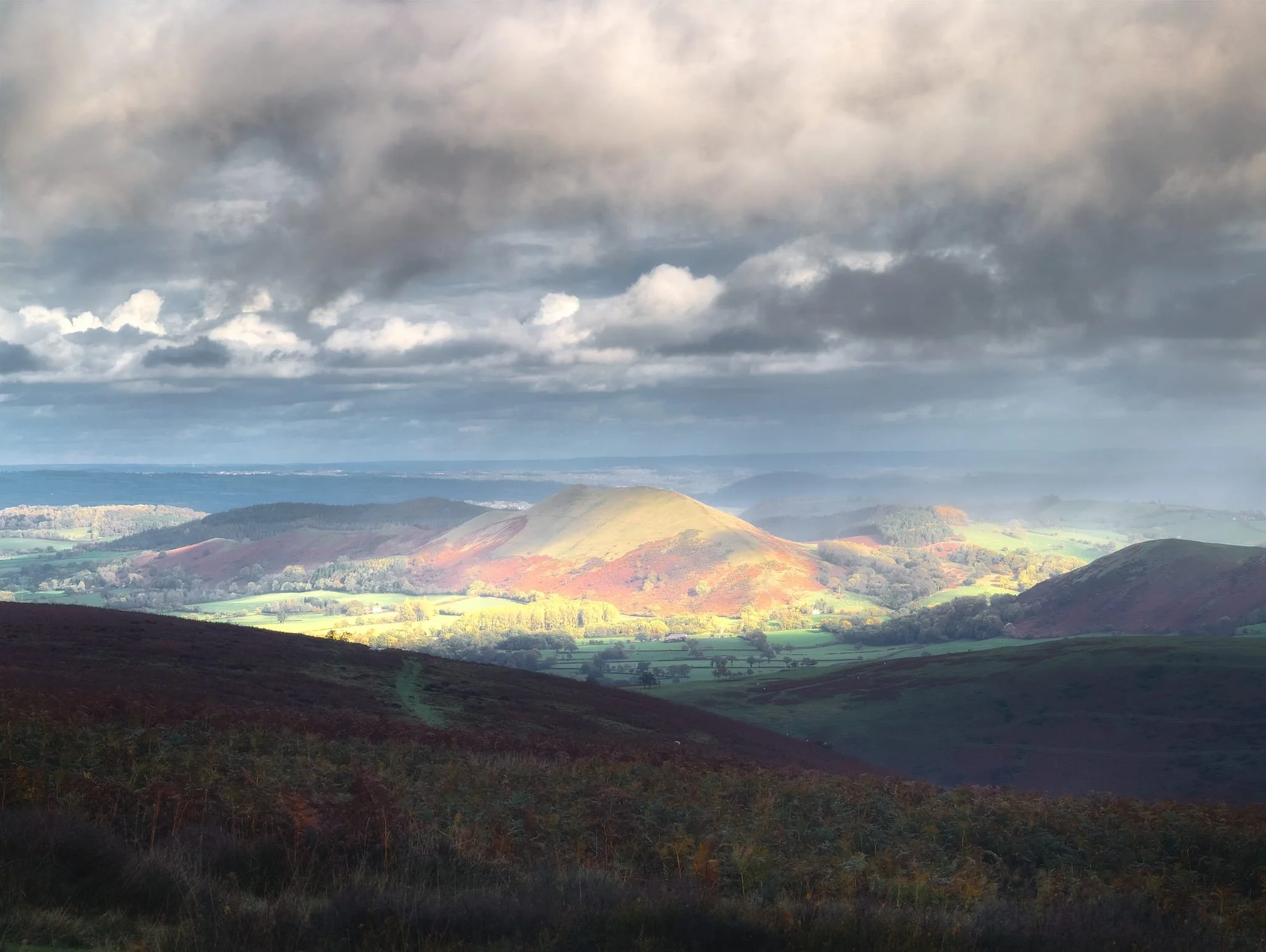 The rain continued to fall and so the light moved on, this time picking out The Lawley as dark clouds raced overhead.