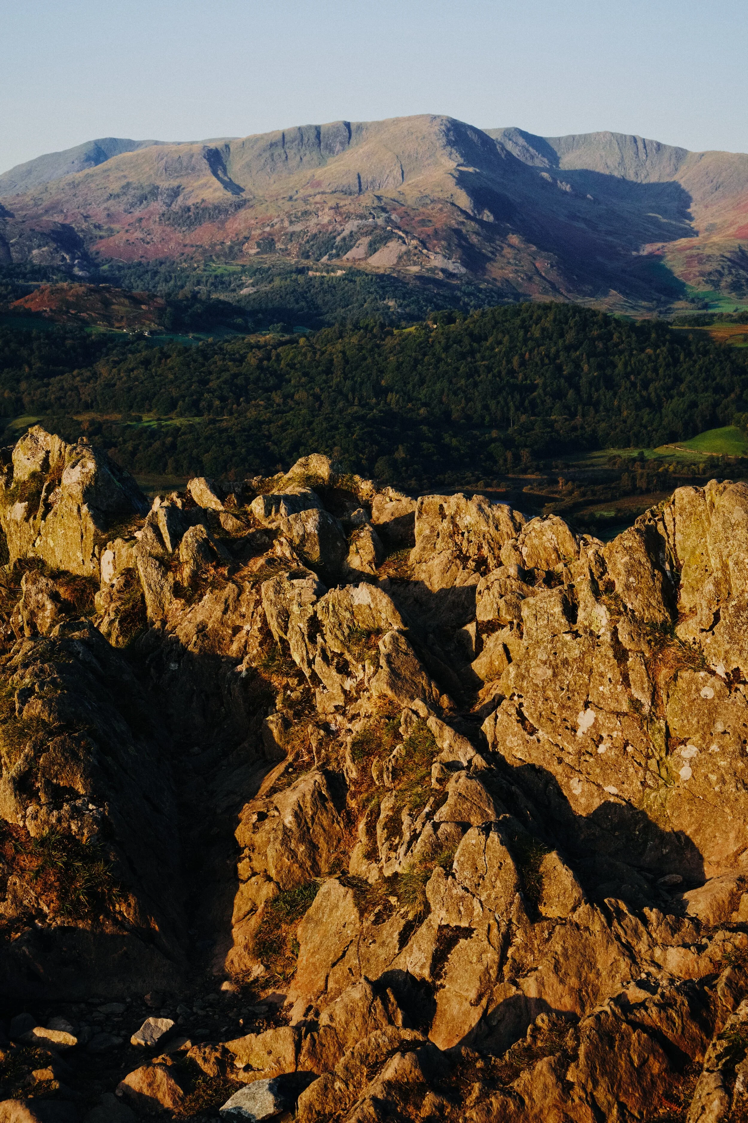 From the summit you can enjoy a clear view of Wetherlam (763 m/2,502 ft), which I shot from the summit’s crags.
