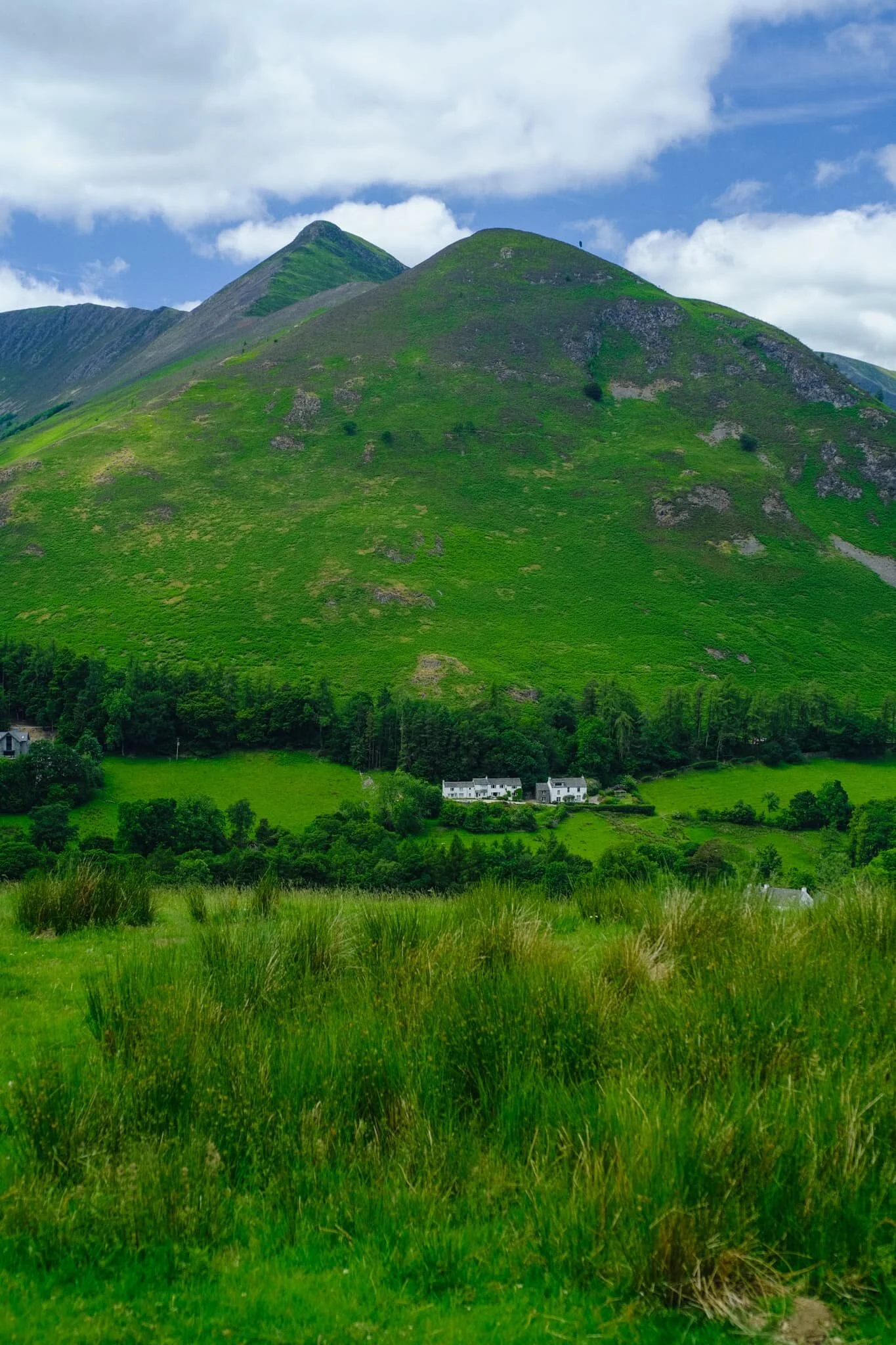 Rowling End (433 m/1,421 ft) slightly obscuring Causey Pike with Birkrigg Farm below.