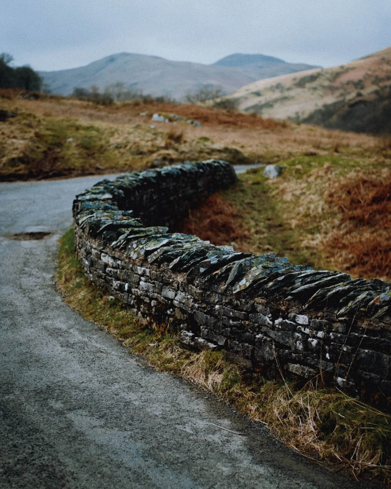 A pretty bridge with the Whinfell Common fells in the distance.