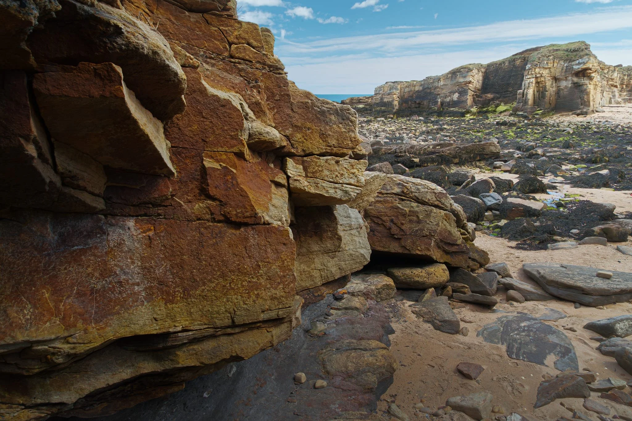 Heading back towards the beach, I tucked myself into a little cove to get this composition towards the sandstone cliffs.