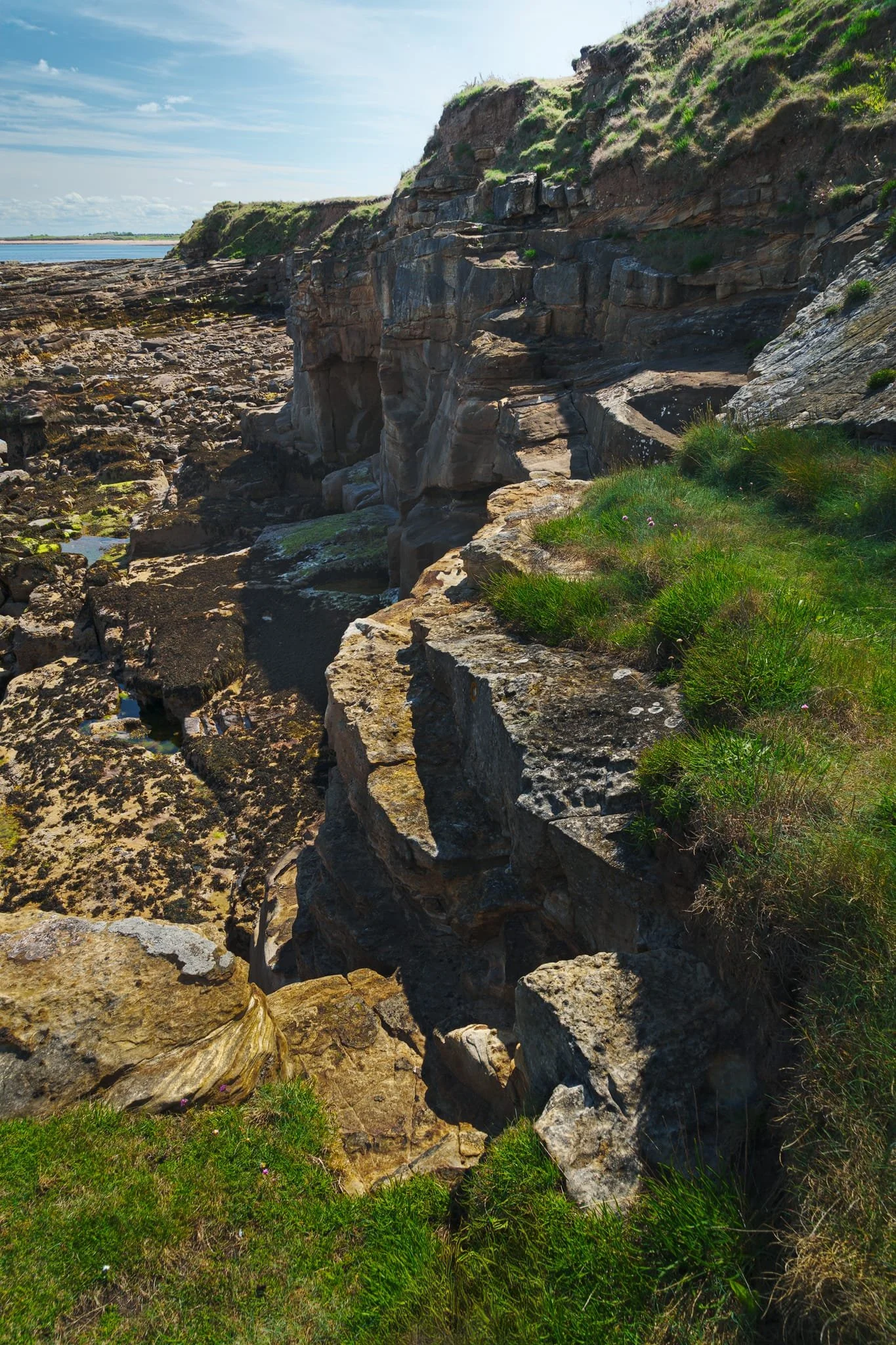 Looking south, some actual cliffs in Northumberland. We will definitely need to come back when both the light isn’t as harsh and when the tide is in. I think this area will look even better when filled with water.
