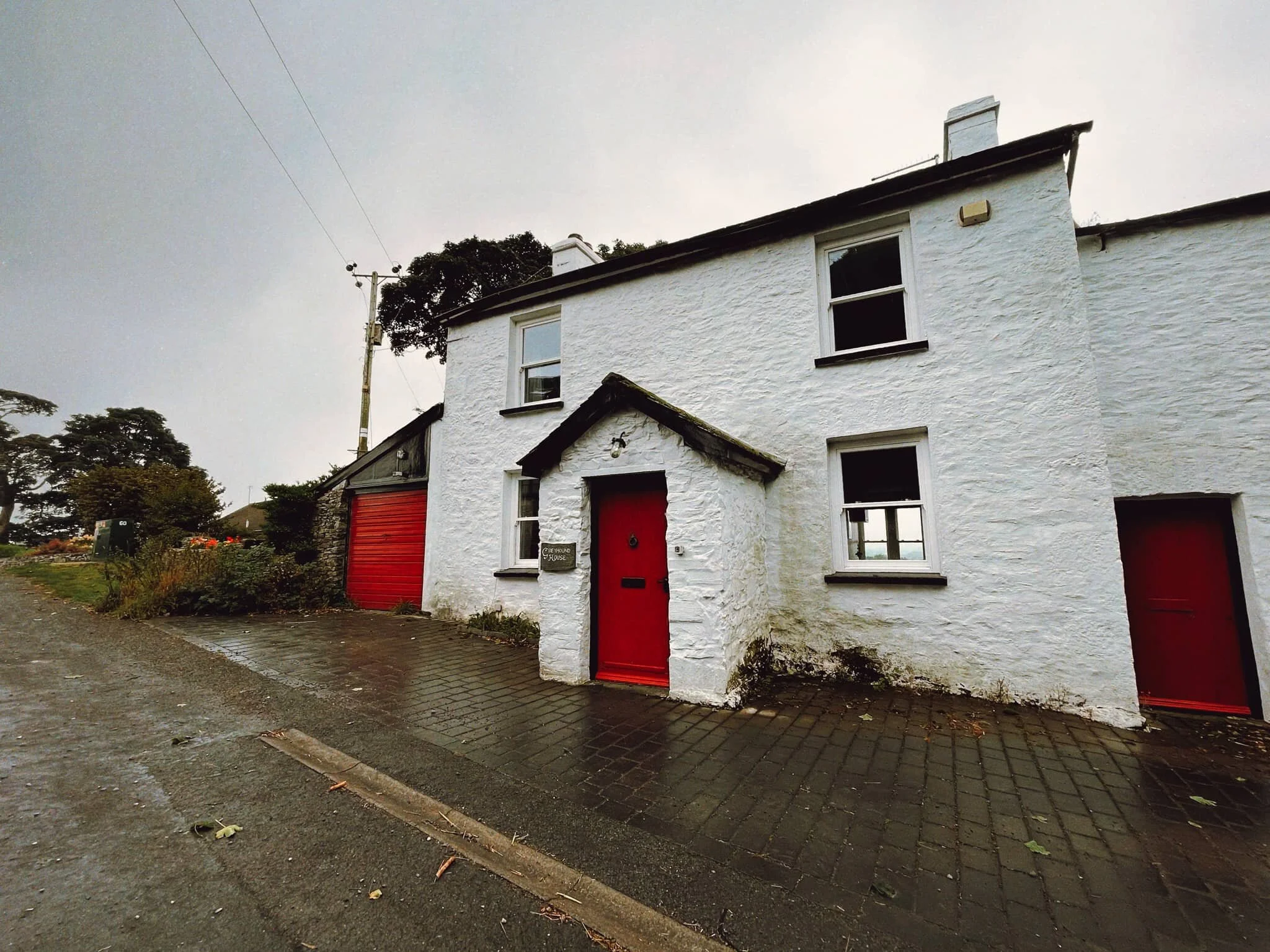 Greyhound House and its lovely bright red doors.