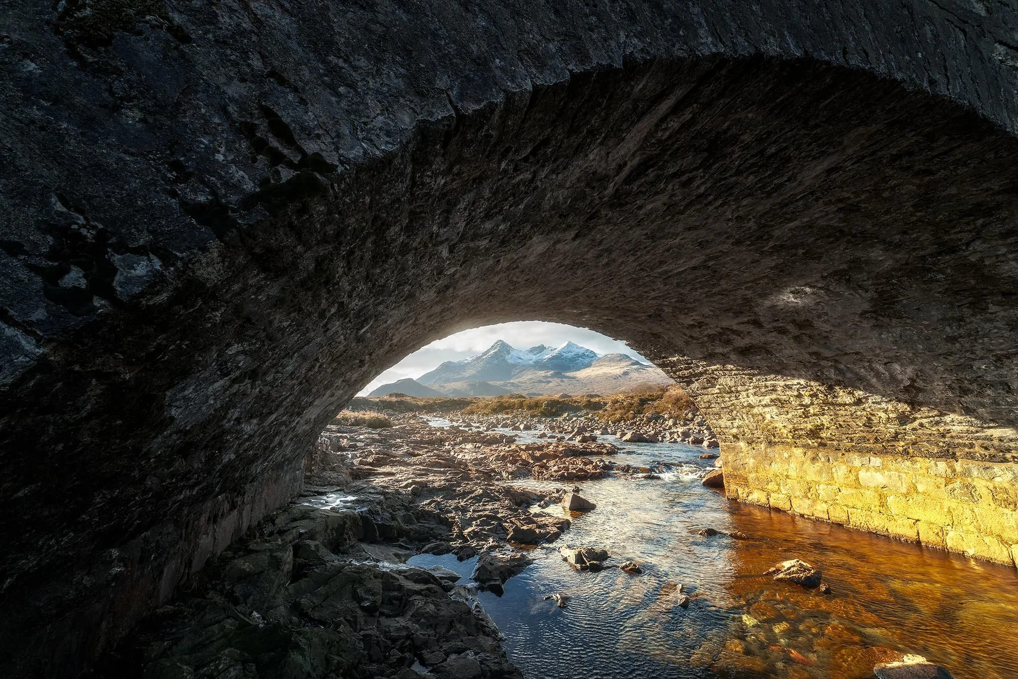 Returning to Sligachan on another day presented a completely different story, with strong sun bursting through the passing, racing clouds. Our first port of call was getting under the Old Sligachan Bridge for a composition of the Black Cuillins.