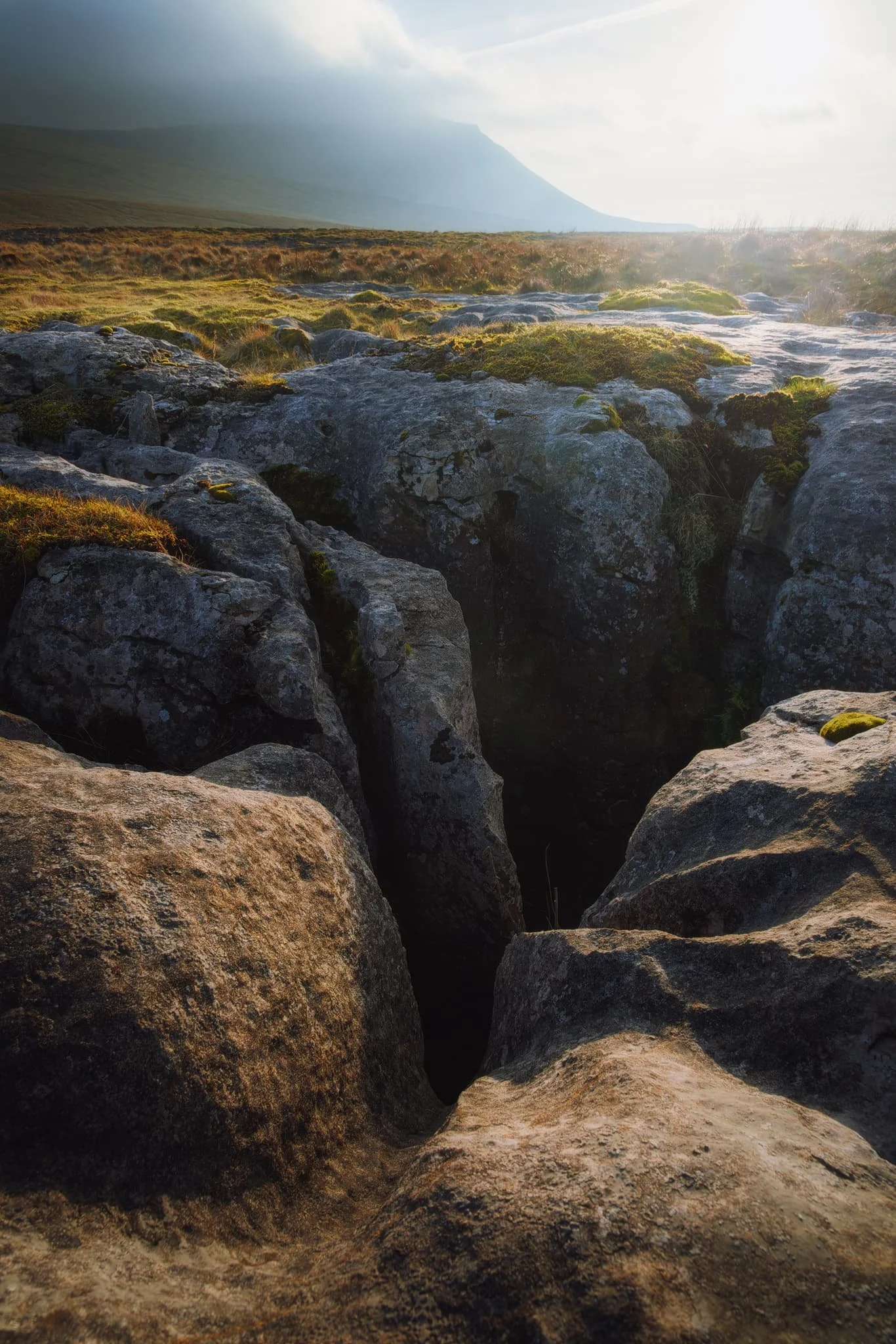 The last deep grike I could find, with more of Ingleborough’s unmistakeable shape being revealed from the clouds. Give it several thousands of years and these grikes will become new potholes down into the caves.