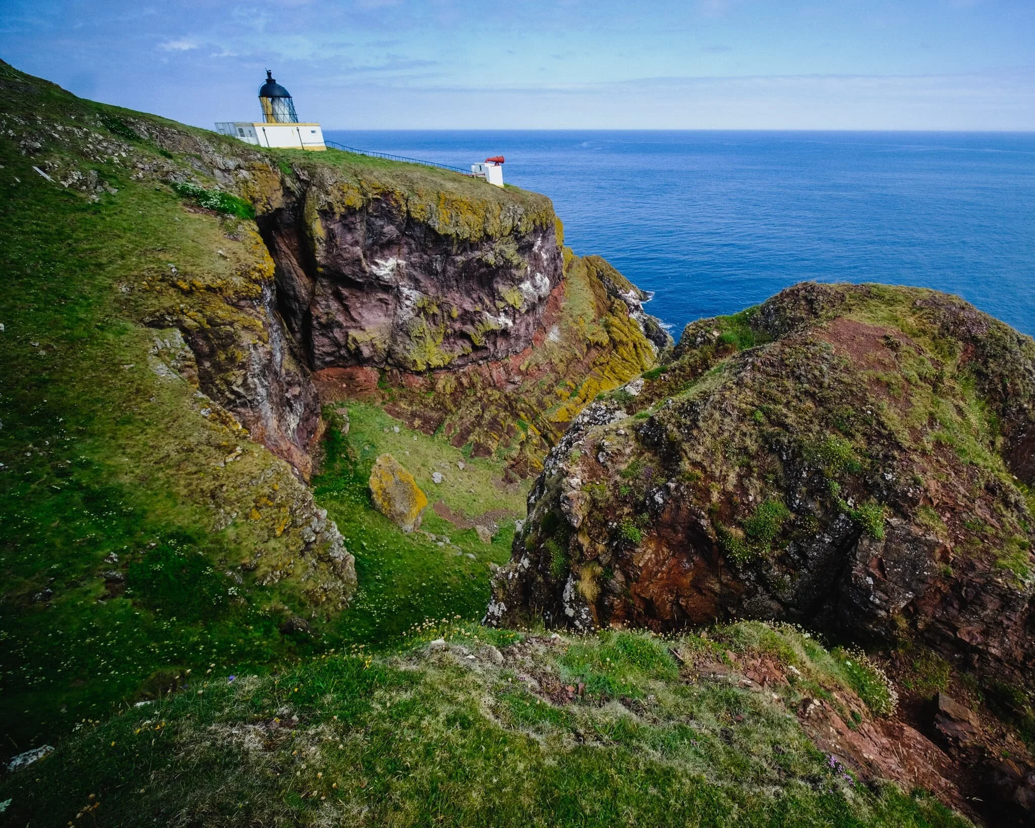 As we climb up St. Abb’s Head, the lighthouse comes into view. We hang around the cliff edges above Clafferts Rock for some compositions involving the lighthouse.
