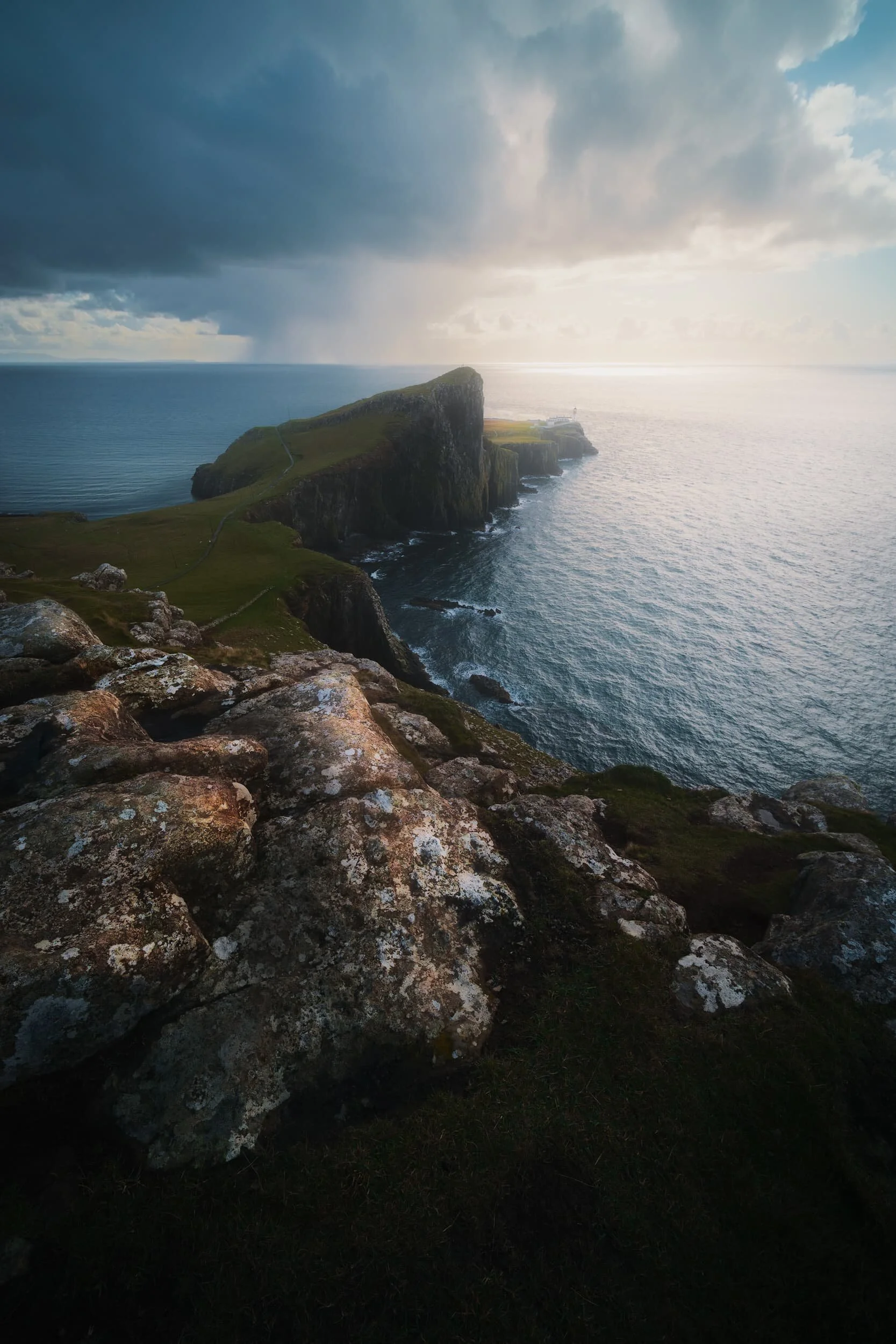 Another ultra-wide composition, shot vertically, showing Neist Point’s cliffs and lighthouse, with the storm quickly approaching us.