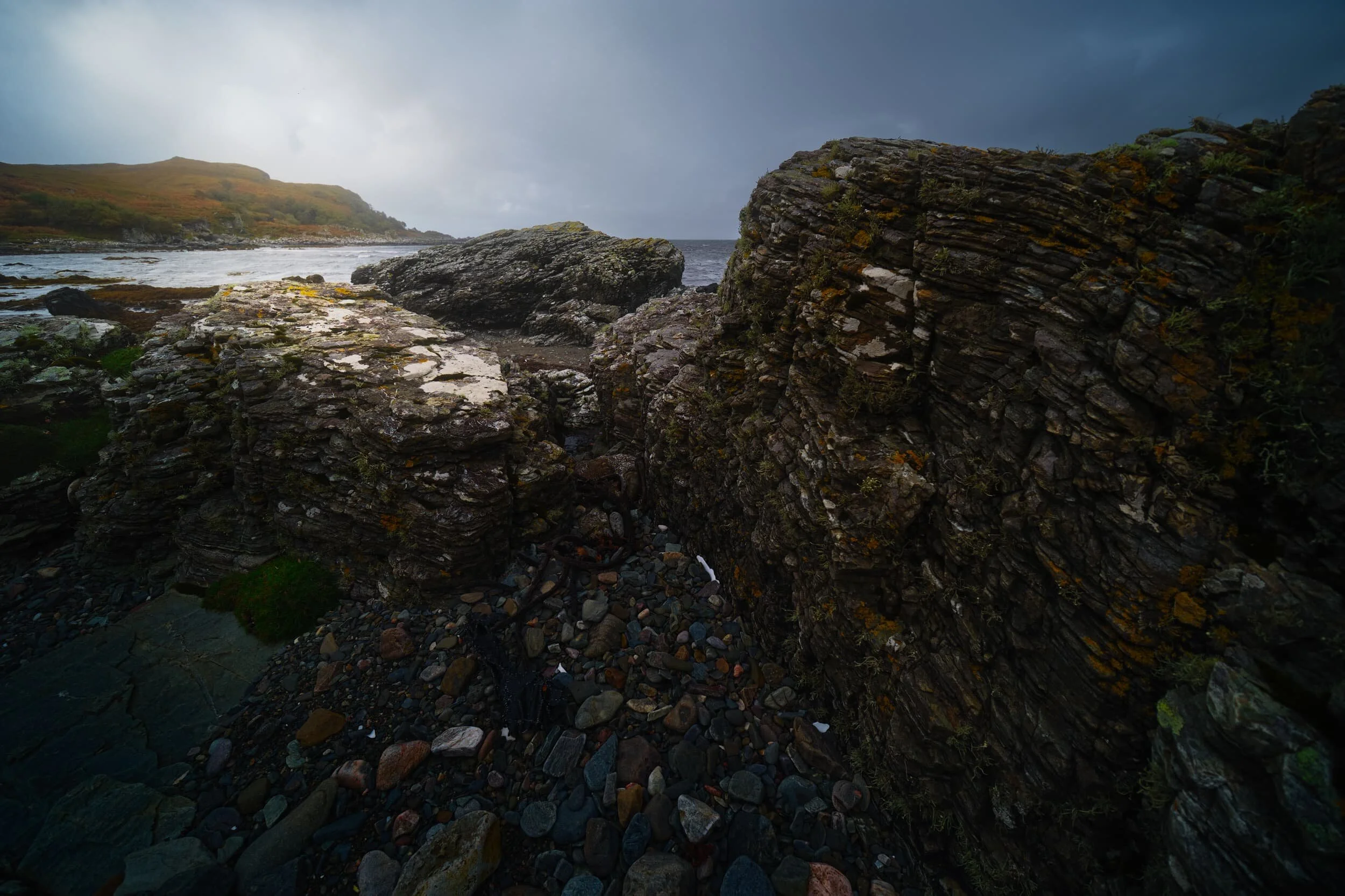 My eye quickly round some rather interesting rock formations around Gillean beach. I endeavoured to make some compositions whilst it was vaguely dry enough to shoot. The hill on the left is Sìthean Beag .