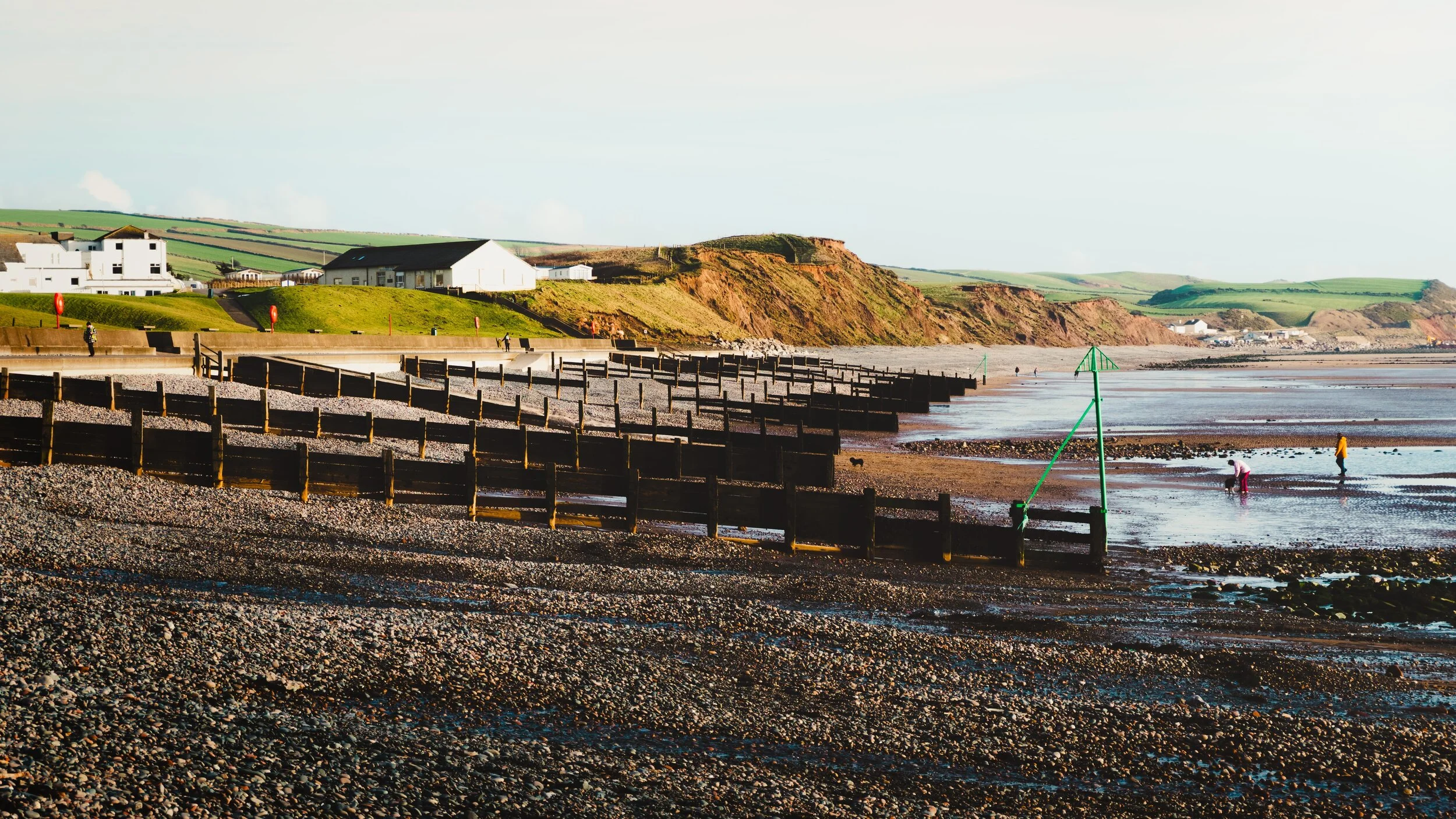 The shingle bank that slopes gently down to the soft sandy beach of St. Bees.