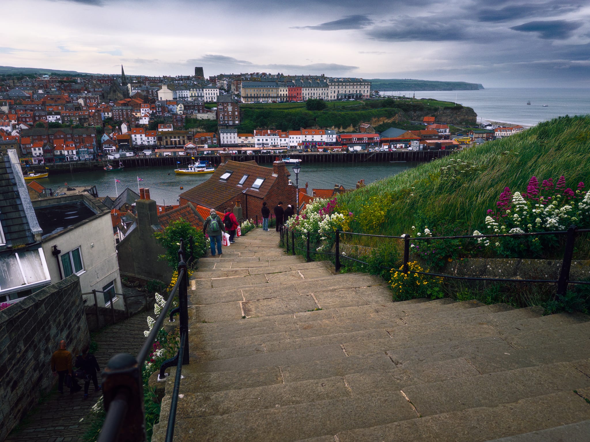 Heading up Whitby’s famous 199 Steps. Originally made of wood and recorded as early as 1340, these steps were used by churchgoers to reach St Mary’s. This exact staircase plays a starring role in Bram Stoker’s 1897 novel Dracula. In the book, the vampire takes the form of a large hound that bounds up these 199 steps after his shipwrecked vessel, the Demeter, runs aground on the beach below.